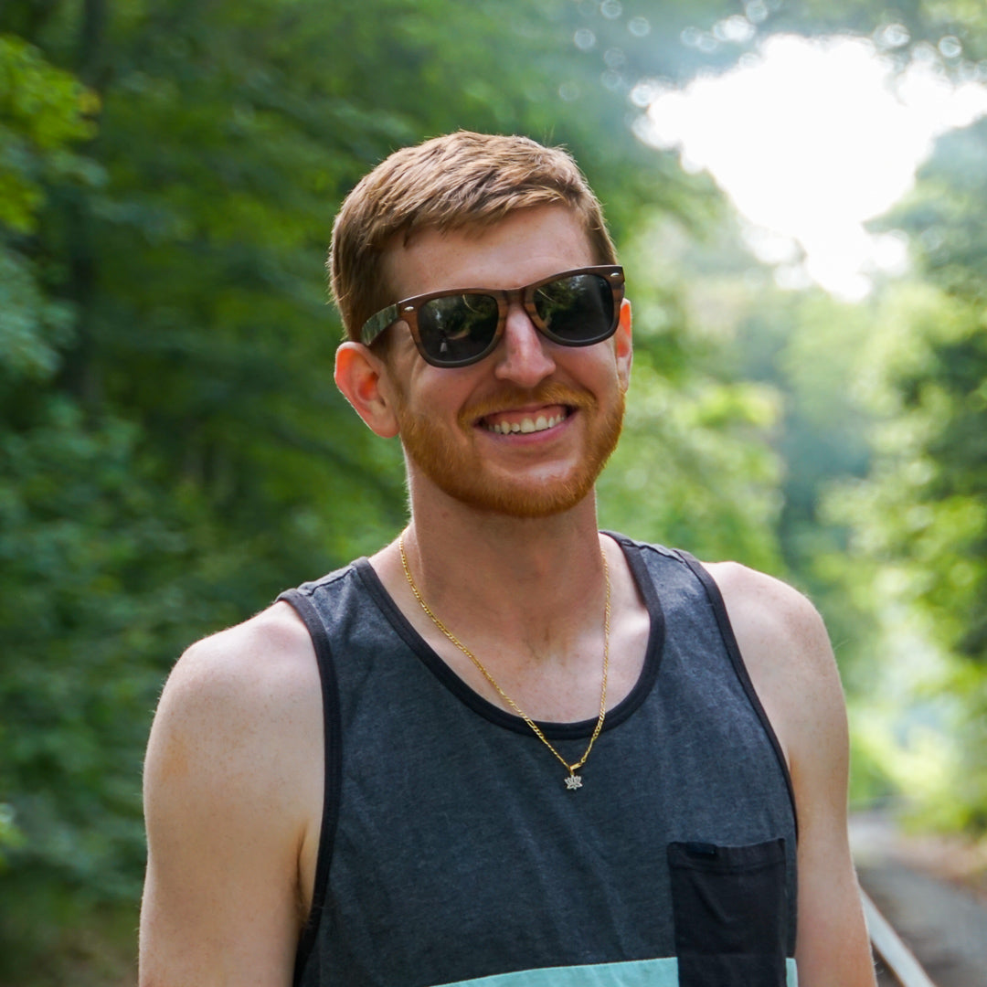 Portrait of Josh Fitzmaurice wearing sunglasses