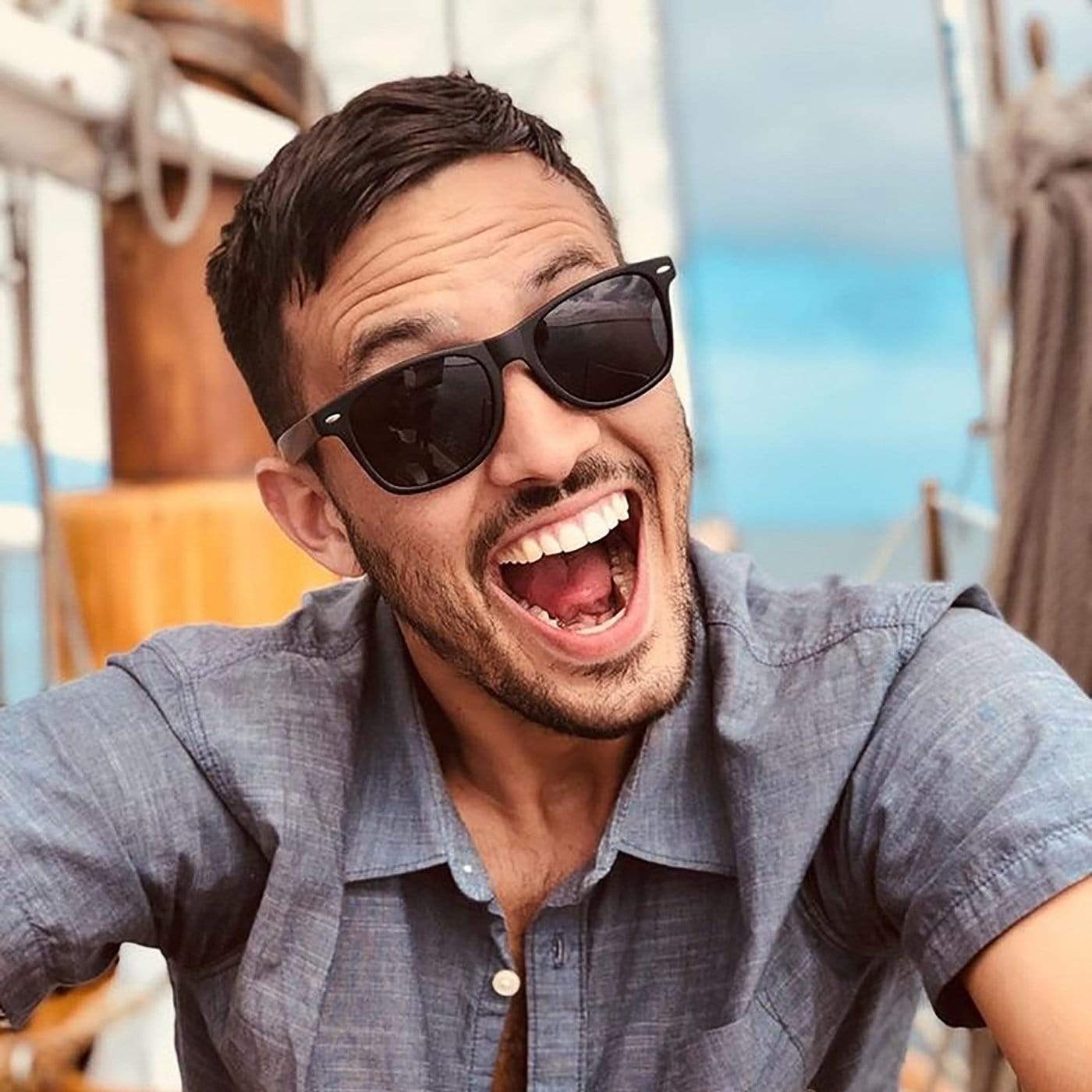 Male Model Wearing Classic Wooden Sunglasses With Smoke Lenses