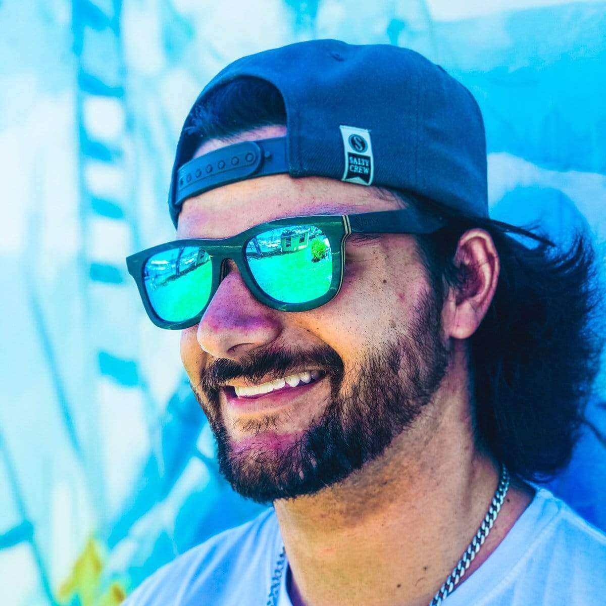 Male Model Wearing Wooden Drifter Sunglasses With Ice Blue Lenses That Can Float In The Water