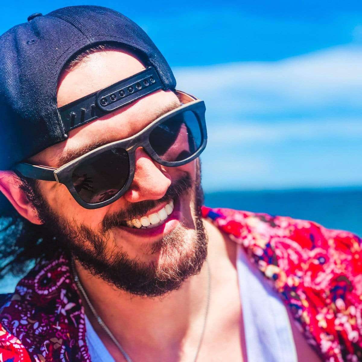 Male Model Wearing Wooden Drifter Sunglasses With Smoke Lenses That Can Float In The Water