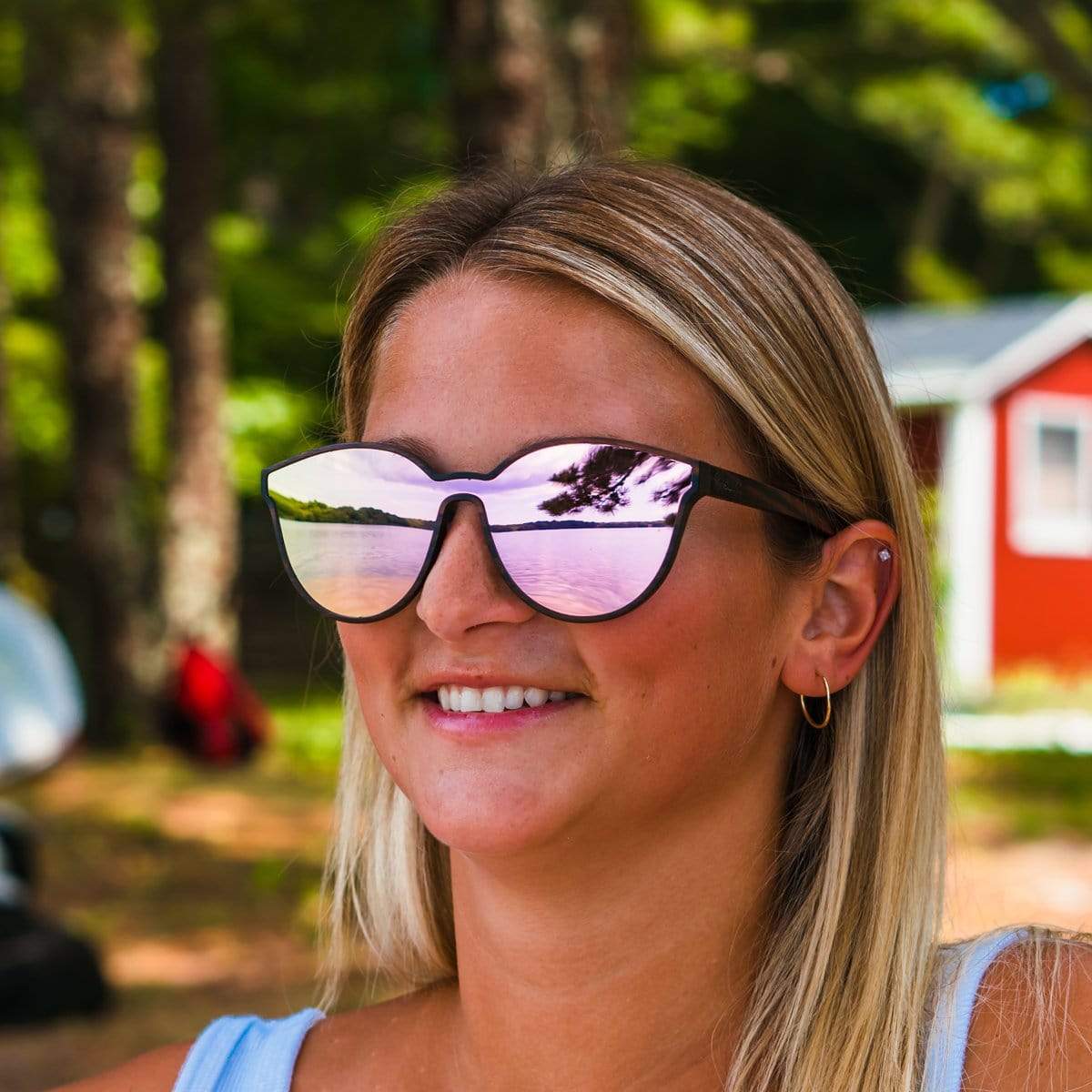 Female Model Wearing Wooden Knockout Sunglasses With Rose Lenses From SLYK