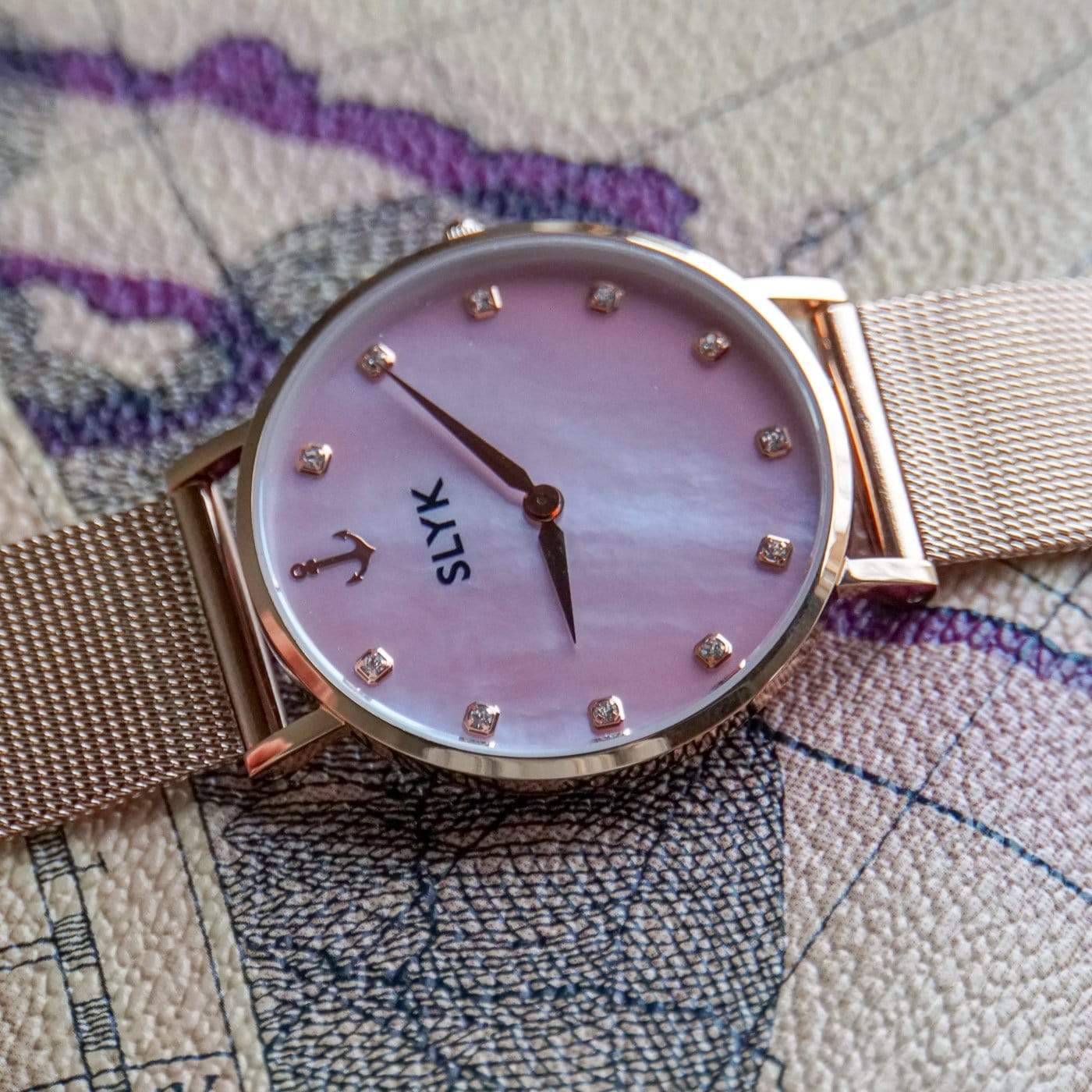 Rose Gold Pink Mother Of Pearl Watch With A Rose Gold Mesh
