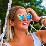 Model Wearing Wooden Bombshell Sunglasses With Ice Blue Lenses