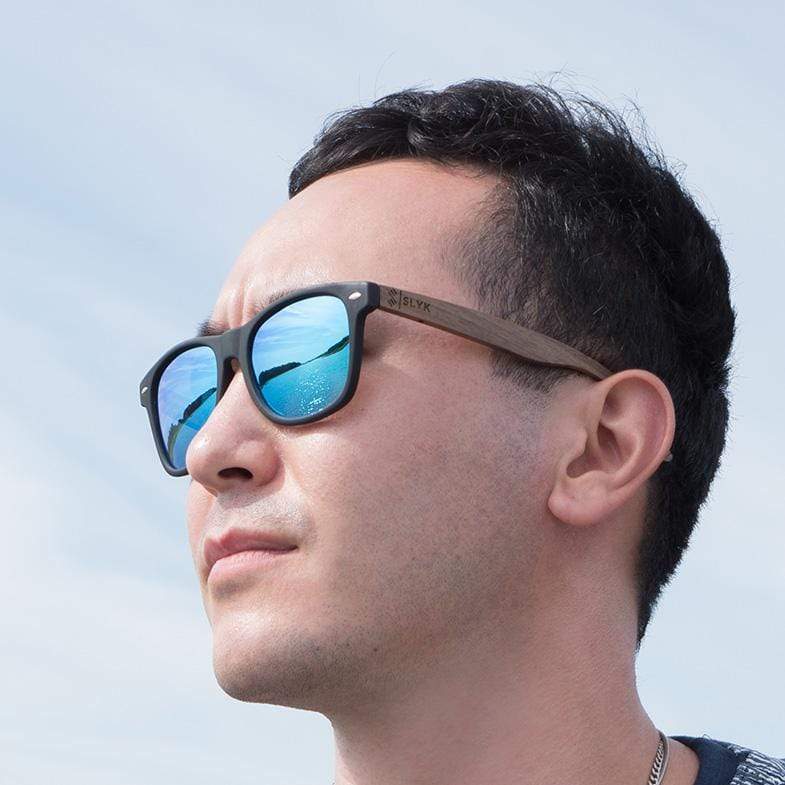 Male Model Wearing Classic Wooden Sunglasses With Ice Blue Lenses