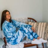 Female Model Wearing Blue Marble Cloud Blend Joggers and a Blue Marble Hoodie From SLYK