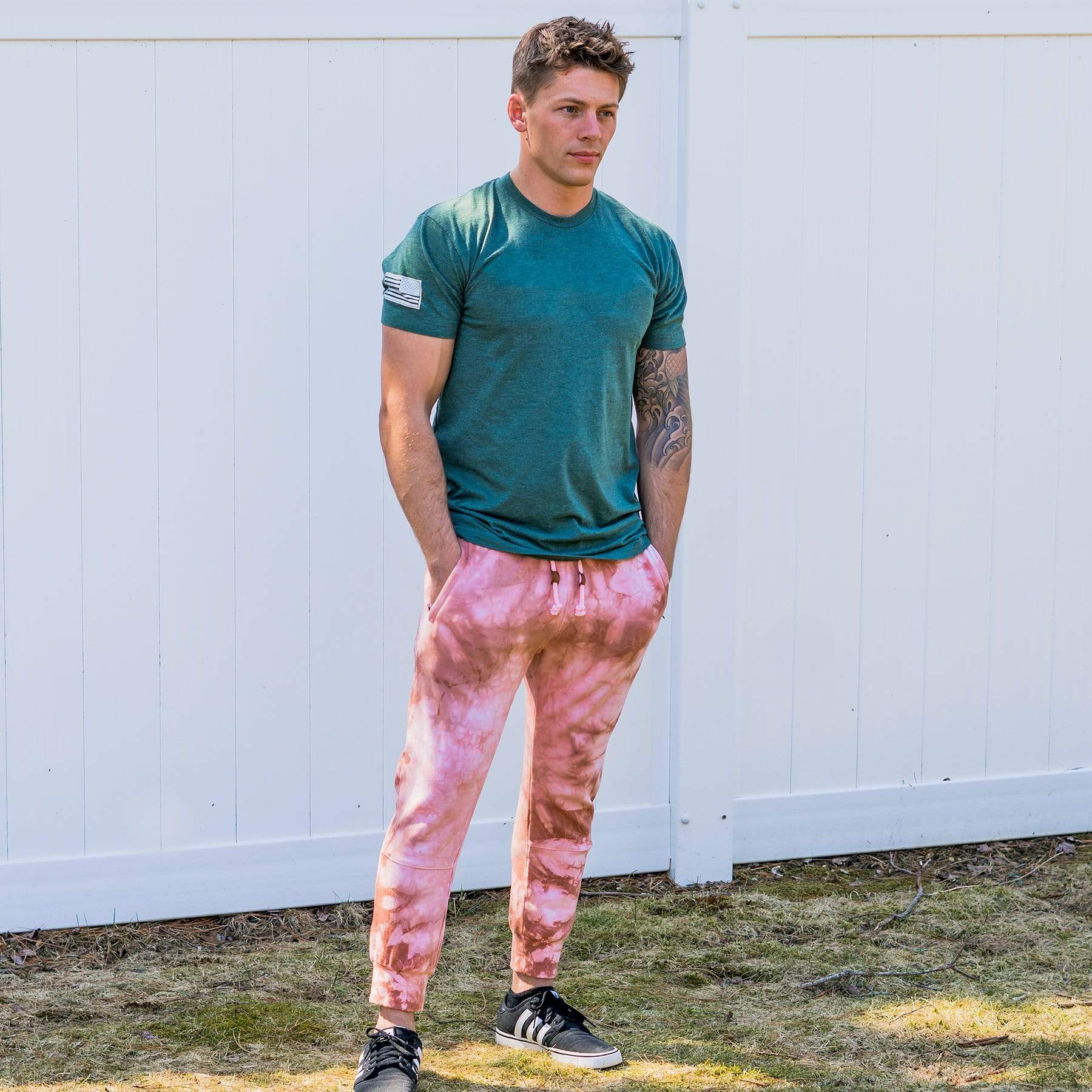 Male Model Wearing Rose Marble Cloud Blend Joggers From SLYK
