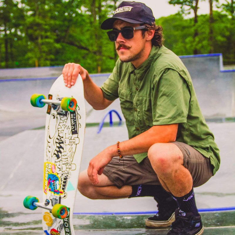 Male Model With Skateboard Wearing Wooden Drifter Sunglasses With Smoke Lenses That Can Float In The Water