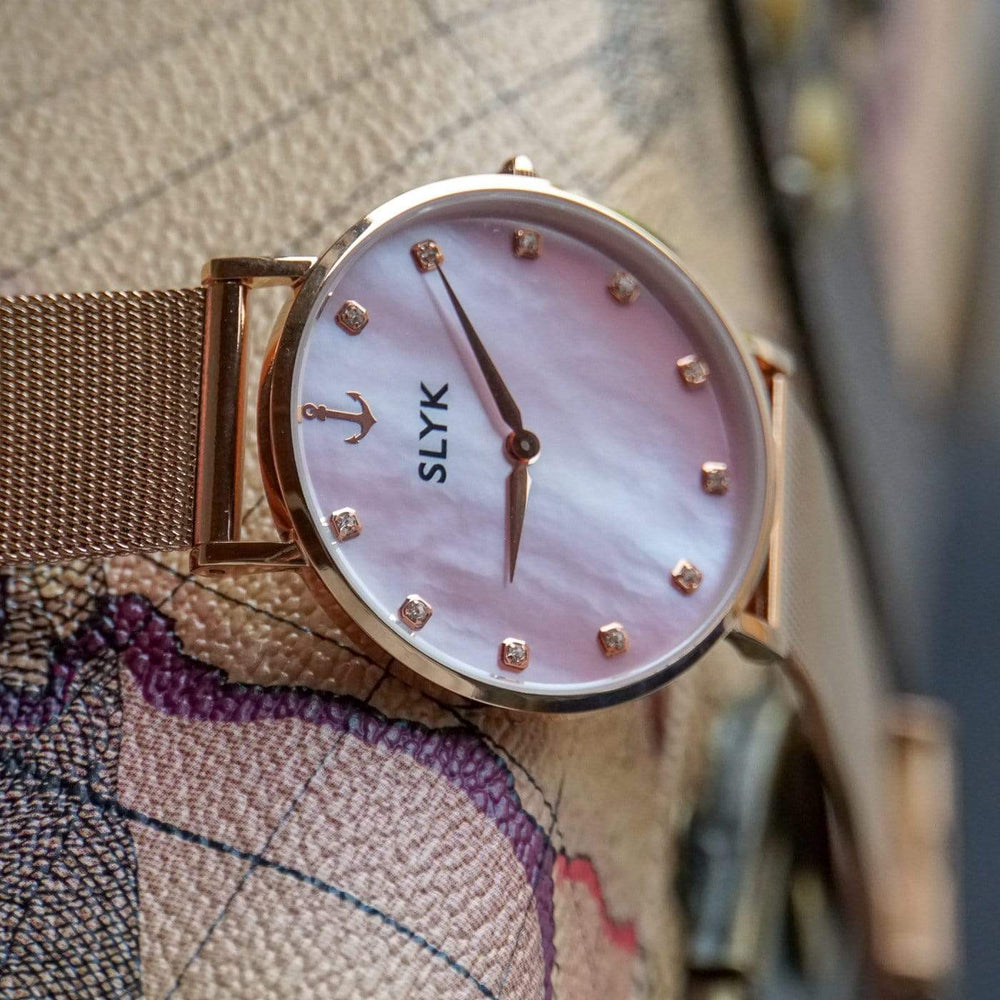 Rose Gold Pink Mother Of Pearl Watch With A Rose Gold Mesh