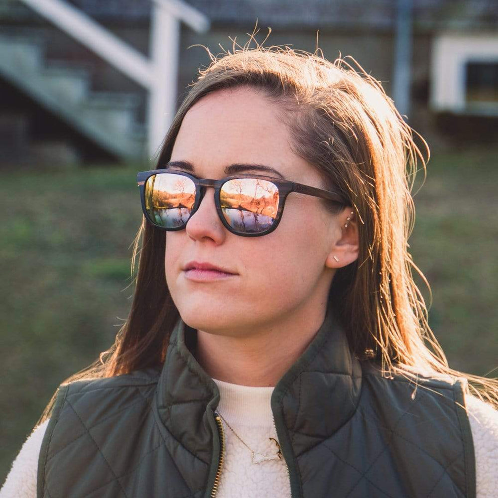 Female Model Wearing Wooden Traveler Sunglasses With Rose Lenses From SLYK 