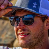 Male Model Wearing Wooden Traveler Sunglasses With Smoke Lenses From SLYK